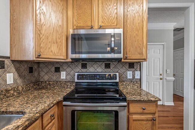 Building Photo - W. Wendover, Beautiful Home, Granite Counter-Tops, SS Appliances, Hardwoods, FP, Deck, Fenced, Ga...