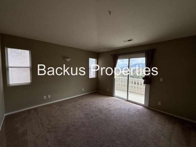 Building Photo - Great two-level home in Las Palmas II with scenic views