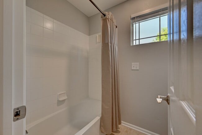 Building Photo - 5 bedroom, 4 bath home with 2 car attached garage