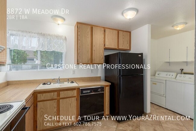 Building Photo - 8872 W Meadow Dr