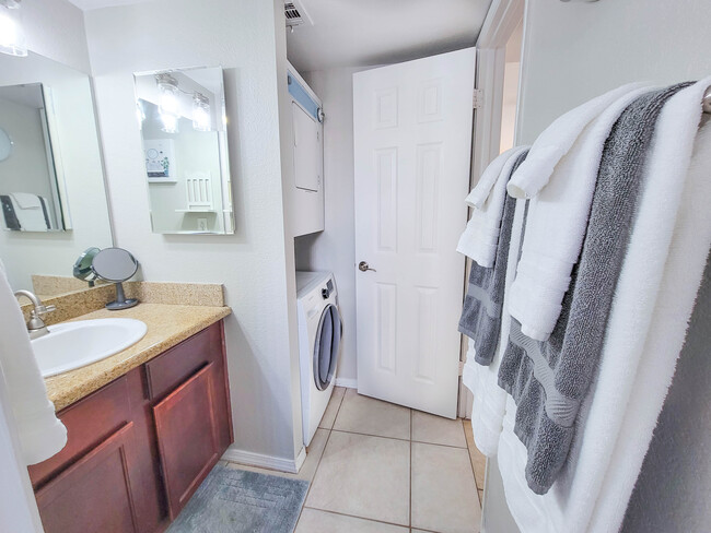 Soft, fluffy towels are always available right next to the in-unit laundry - 3500 N Hayden Rd