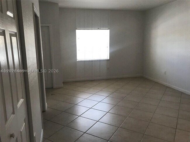 Building Photo - 5743 NW 114th 106