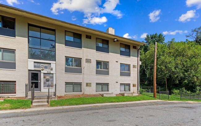 Primary Photo - Modern 2-Bedroom Apartment with In-Unit La...