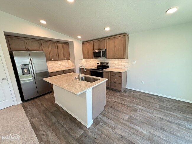 Building Photo - NEW Modern Townhouse with Two Car Garage i...