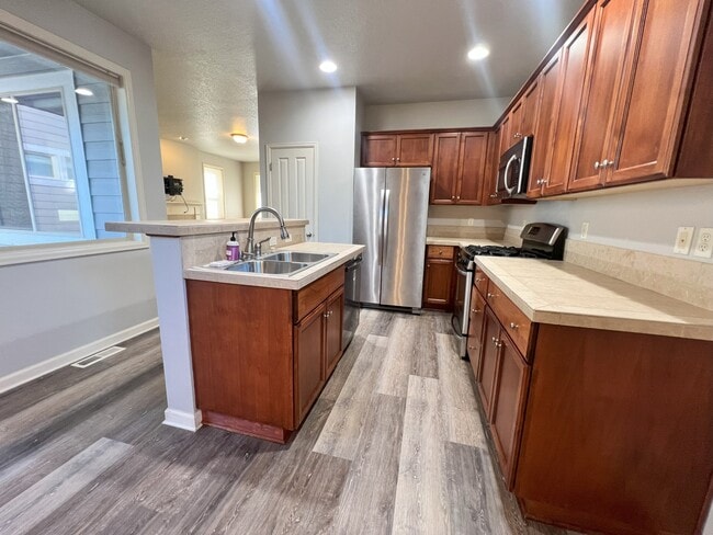 Building Photo - 3075 NW Flame Tree Ln