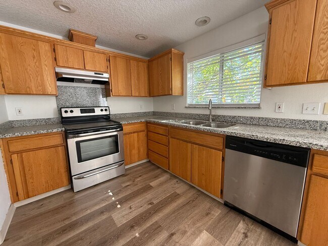 Building Photo - 3 Bed, 2 Bath with Garage, W/D, and Fenced...