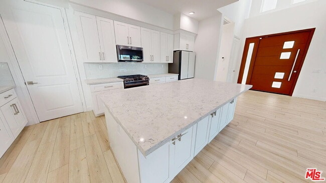 Building Photo - 8474 N. Camelia Court