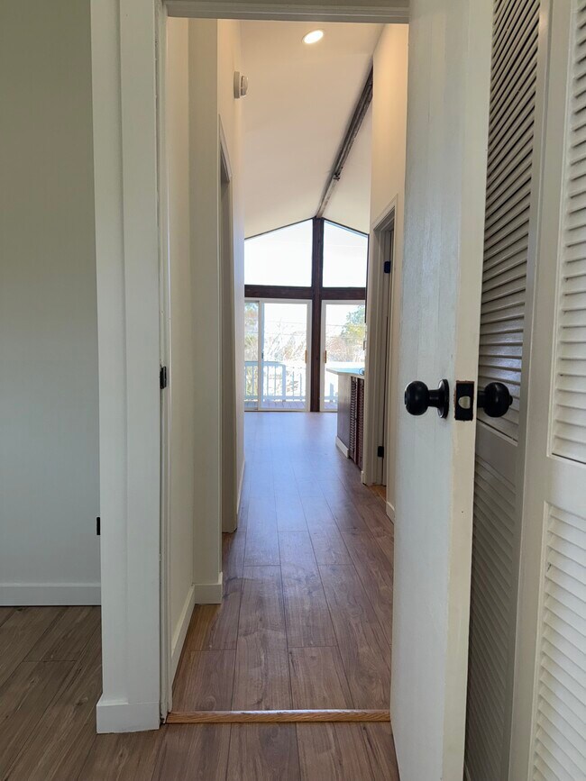 Hallway leading to living room/kitchen - 12516 W Torquay Rd