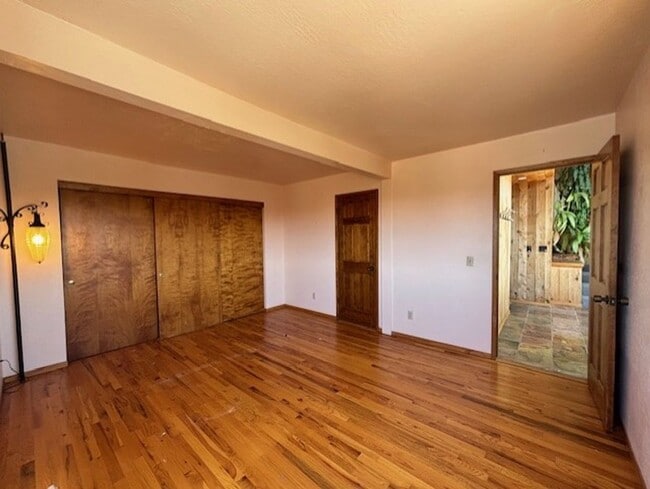Building Photo - Stunning Hilltop Retreat with Panoramic Oc...
