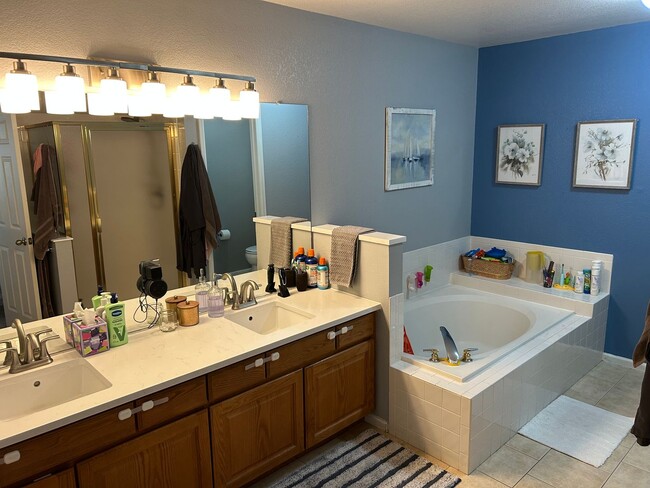 Building Photo - Rare 4BR End-Unit in Northpark with Finished Basement and 2-Car Garage