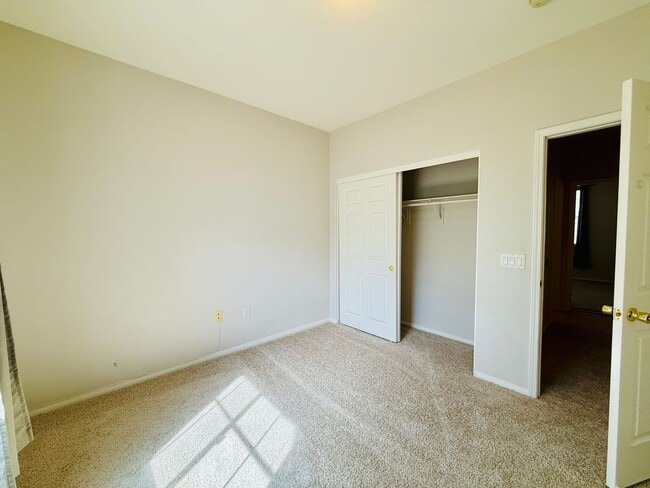 Building Photo - Immaculate and Inviting Two-Story Condo in Lone Mountain Available! 1/2 OFF THE FIRST FULL MONTH'...
