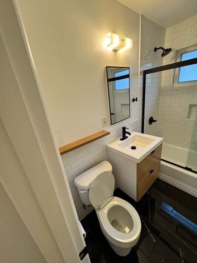 Building Photo - Beautifully remodeled 4 bedroom with ADU! PVT backyard, garage pets ok!