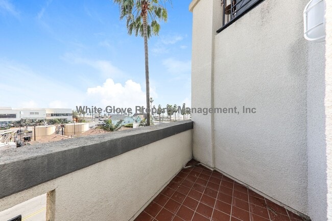 Building Photo - Ocean View Condo Just Steps from Main Street & the Beach – 3 Balconies, Gated Community, Pool & P...