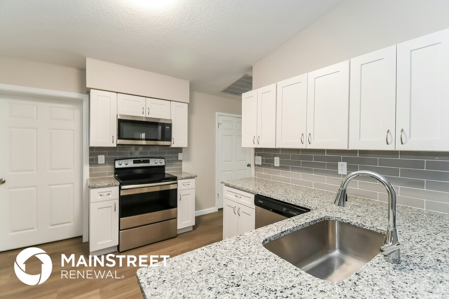 Building Photo - 7263 Eudine Dr N