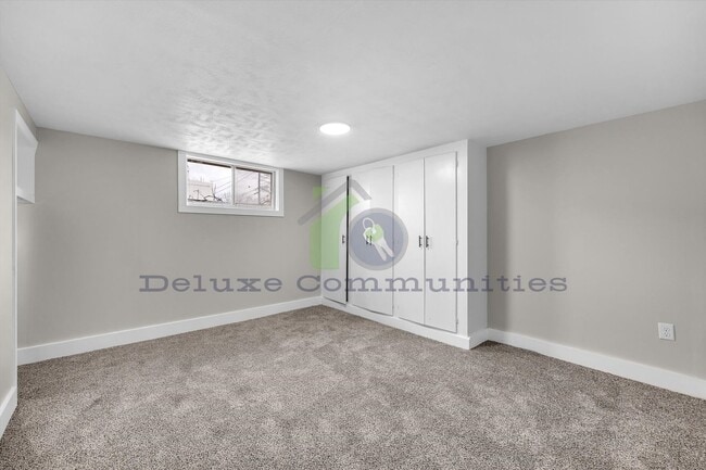 Building Photo - Spacious 4 Bedroom- With Extra room! New Remodel!