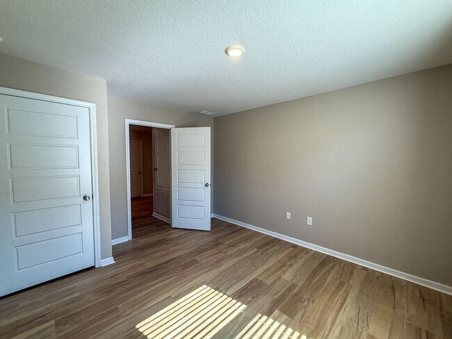 Building Photo - Updated 4 Bedroom 2 Bath Rental Near Navy Federal - Lawn Care Included!