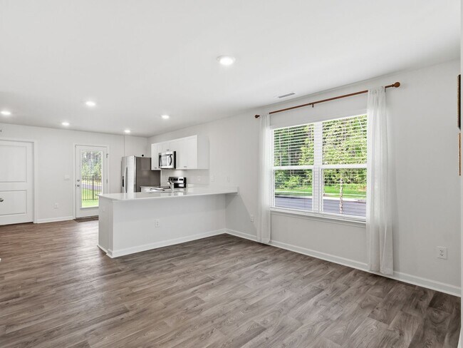Building Photo - Newly Built 3BD, 2.5BA End Unit Raleigh Townhome with a Fenced Yard in a Prime Location