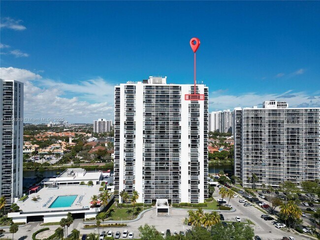 Building Photo - 3675 N Country Club Dr