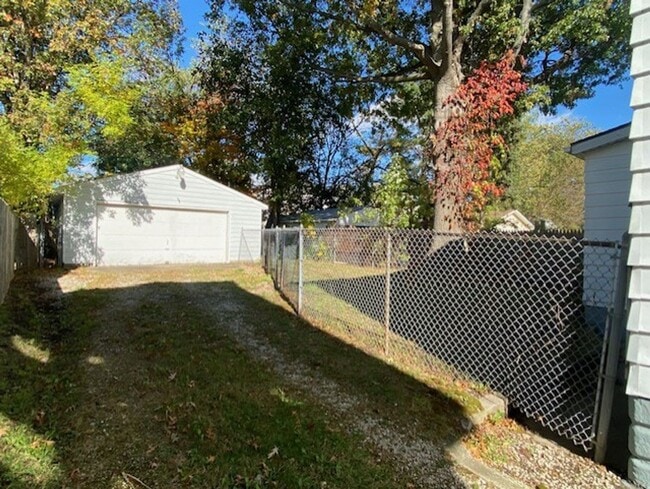 Building Photo - Updated 4-Bed with Porch & 2-Car Garage on...