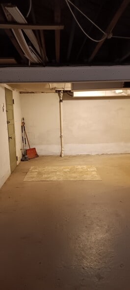 Large basement area 30' by 25' with door to garage. - 117 Fern Hollow Rd