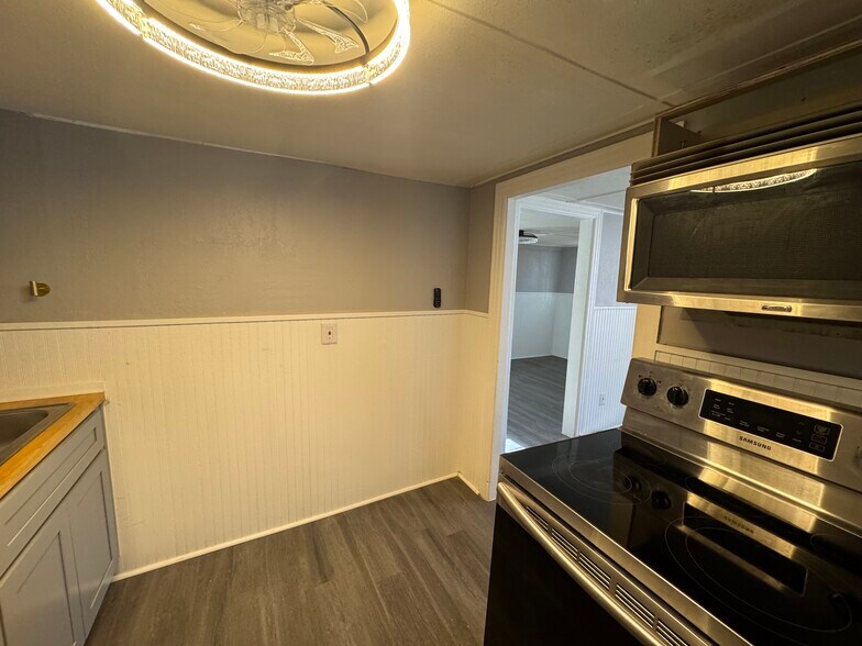 Kitchen view towards bedroom - 2101 Delesseps Ave