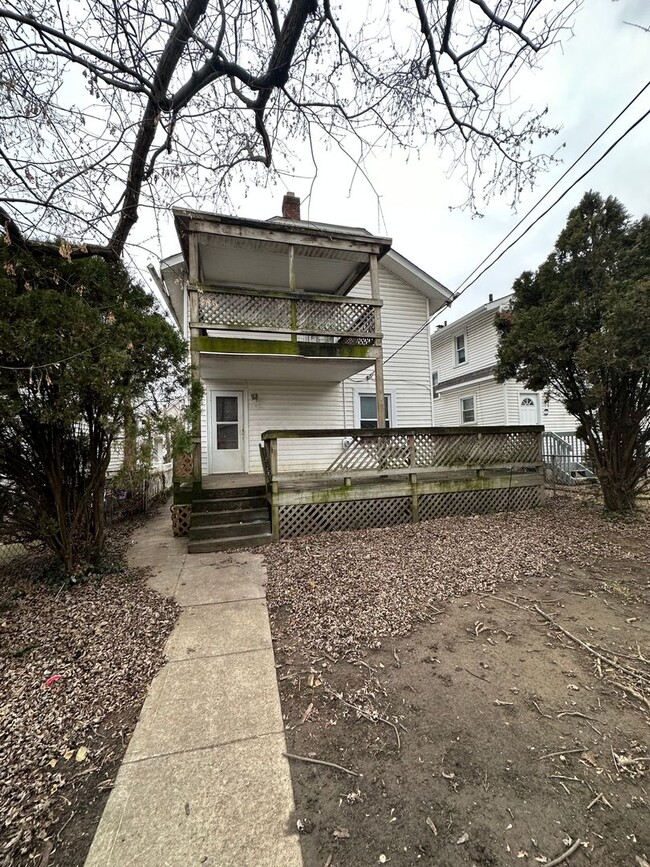 Building Photo - Introducing a charming Three Bedroom, One ...