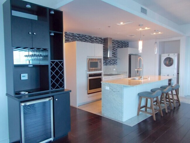 Building Photo - Experience elevated high-rise living at The Martin.