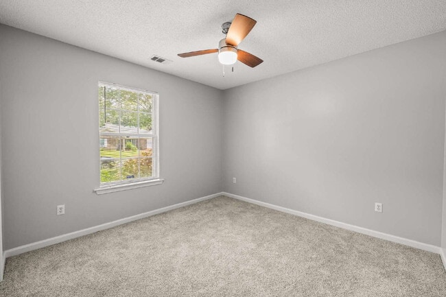 Building Photo - Charming All-Brick Home with Garage & Cove...