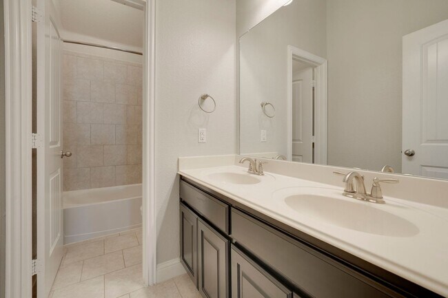 Building Photo - Welcome to this beautiful 4-bedroom, 3.5-b...