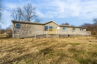 Building Photo - Spacious 4-Bedroom Home in Cave Springs – ...