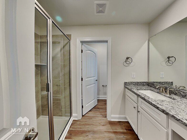 Building Photo - 6935 Woodland Stream Pl