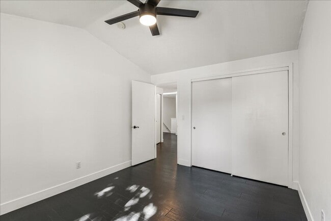 Building Photo - Versatile 4-Bedroom Corner Condo with Main...