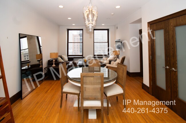 Building Photo - Furnished Luxury Condominium with Stunning...