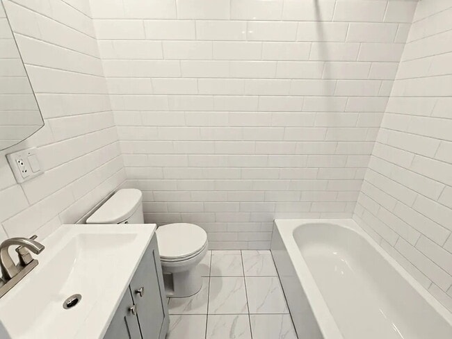 Building Photo - sunny, renovated, rent-stabilized one-bedroom apartment