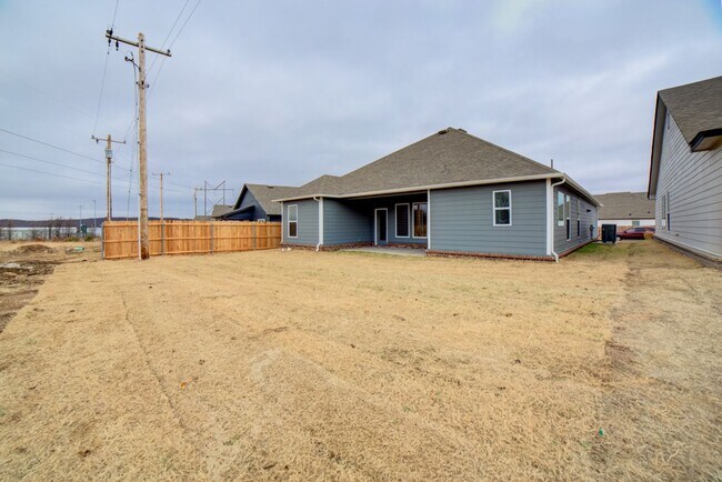 Building Photo - 4 BEDROOM CAPITAL HOME IN SAND SPRINGS!!!
