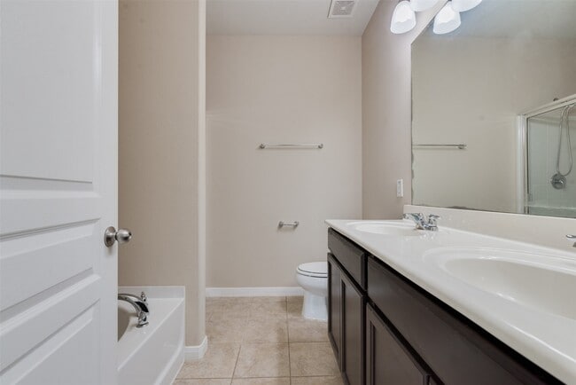 Building Photo - 8127 Running Brook Ln