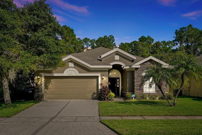 Building Photo - "Stunning 3BR Orlando Home with Private Screened Pool, Spa & Spacious Living Areas"