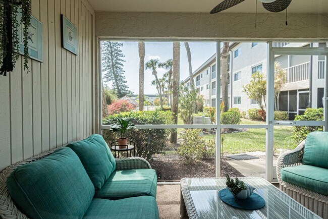 Building Photo - AVAILABLE NOW! Furnished Ground-Floor End Unit | Lake & Pool Views | Minutes to Marco Island & Do...