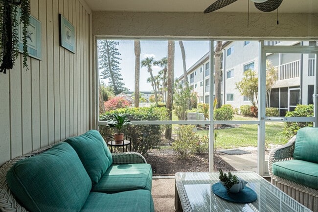 Building Photo - Ground Floor End Unit 2-Bed Condo with Lake Views | AVAIL NOW