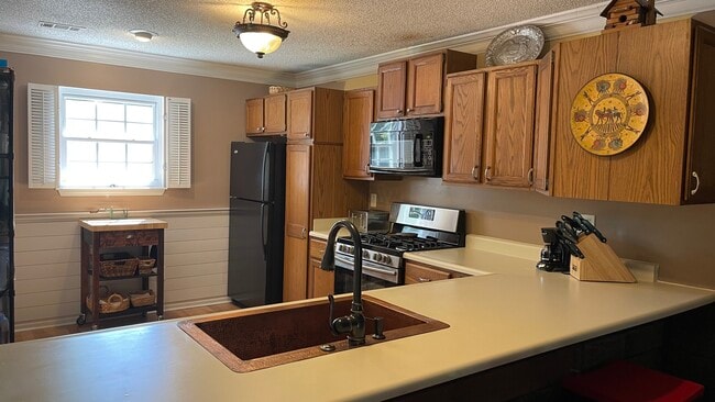 Kitchen from den - 229 Quail Run