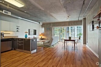 Building Photo - Beautiful Furnished Downtown Apartment For...