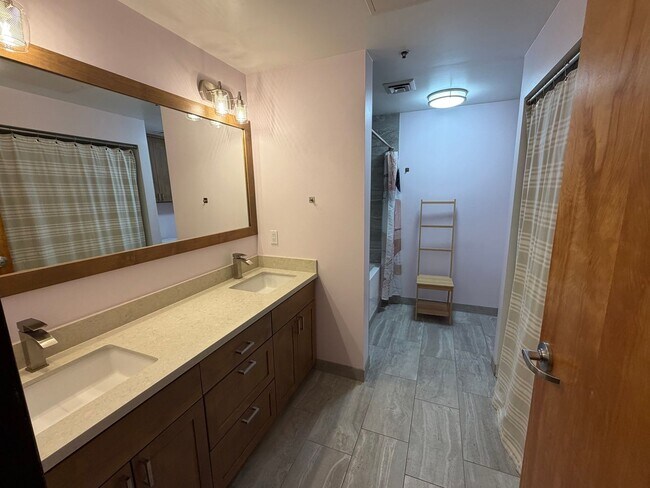 Building Photo - McKenzie Lofts - 2nd floor west facing Pearl District studio w/parking/storage/covered balcony