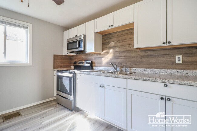 Building Photo - Presented by HomeWorks Management