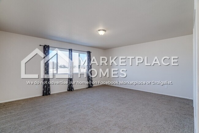 Building Photo - 9799 Desert Lily Cir