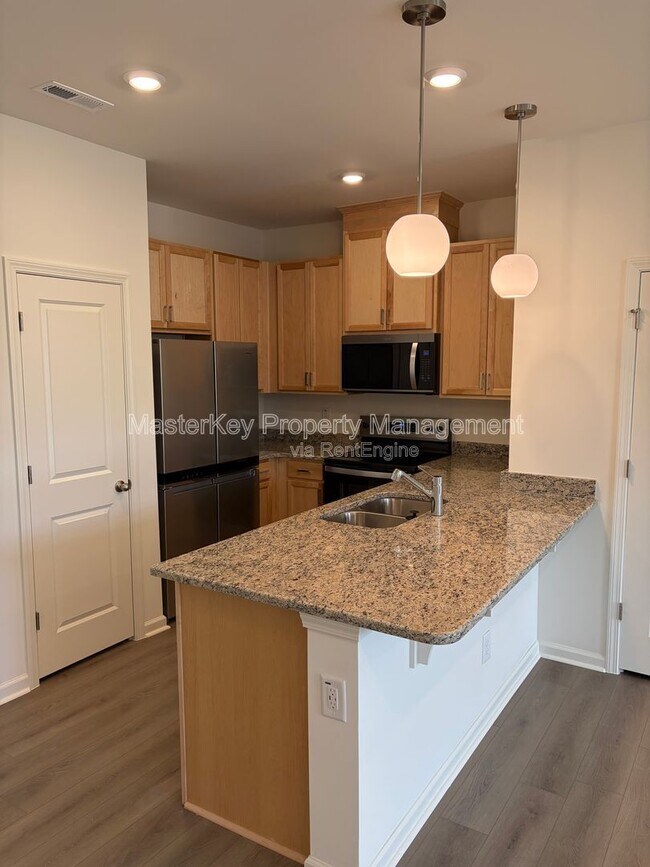 Building Photo - 10636 Brookside Reserve Rd