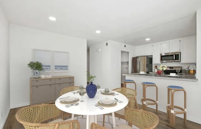 Building Photo - Stylish Coastal Condo in Newport Terrace –...