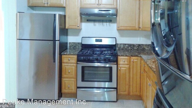 Building Photo - 2 br, 1.5 bath House - 11806 Breton Ct. #12C