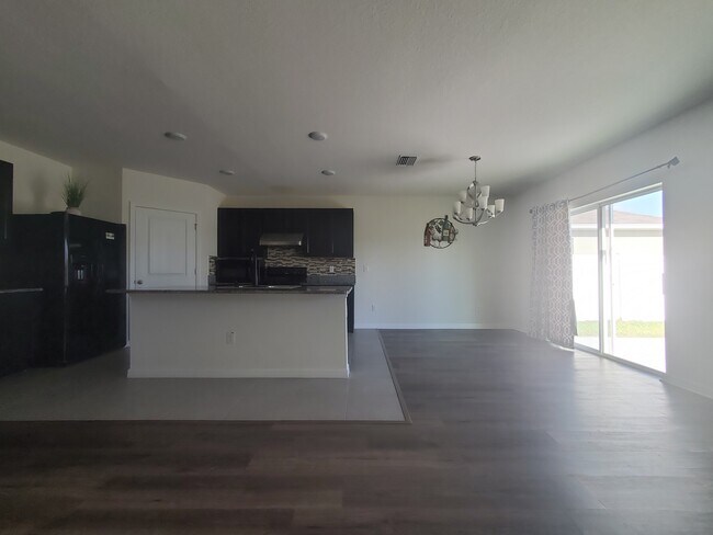 Building Photo - 6776 Wagon Trail St