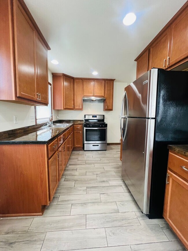 Building Photo - Updated 2-Bedroom Home with Finished Basement Space