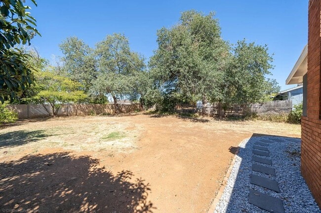 Building Photo - Home with Carport